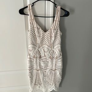 Size small white lace dress with nude underlining